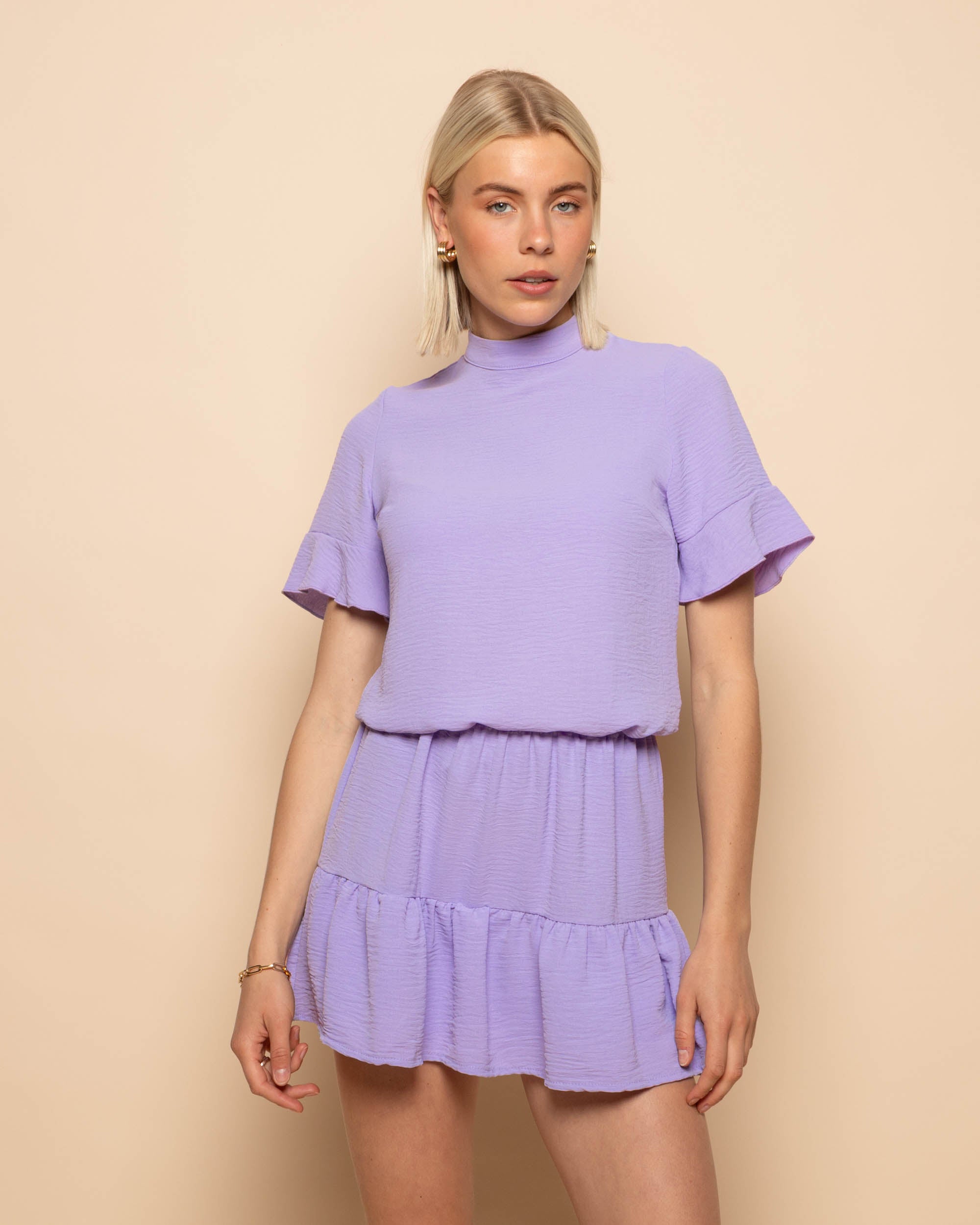 JULIE RUFFLE TOP LILA