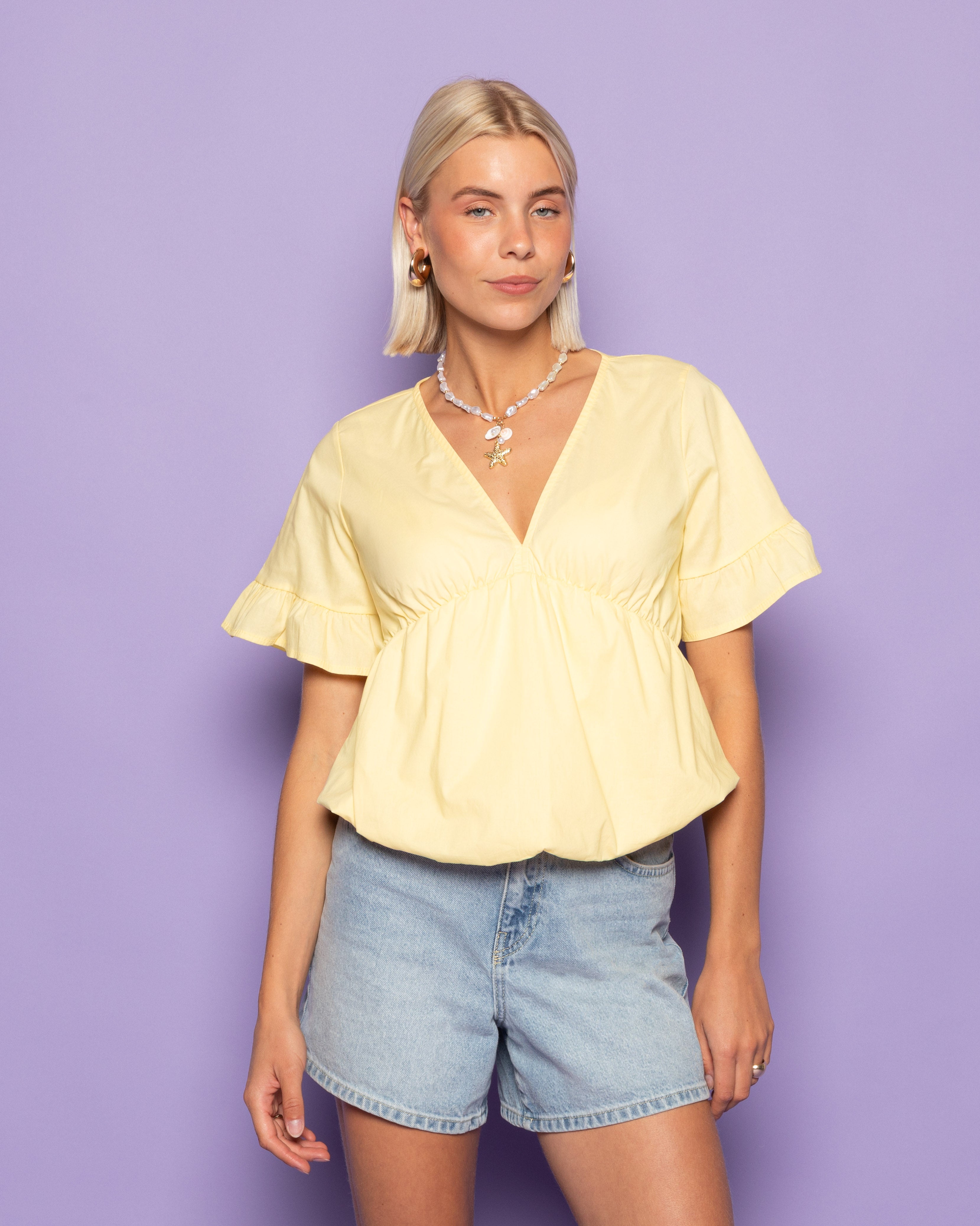 ANA POPLIN BUBBLE HEM TOP BUTTER YELLOW