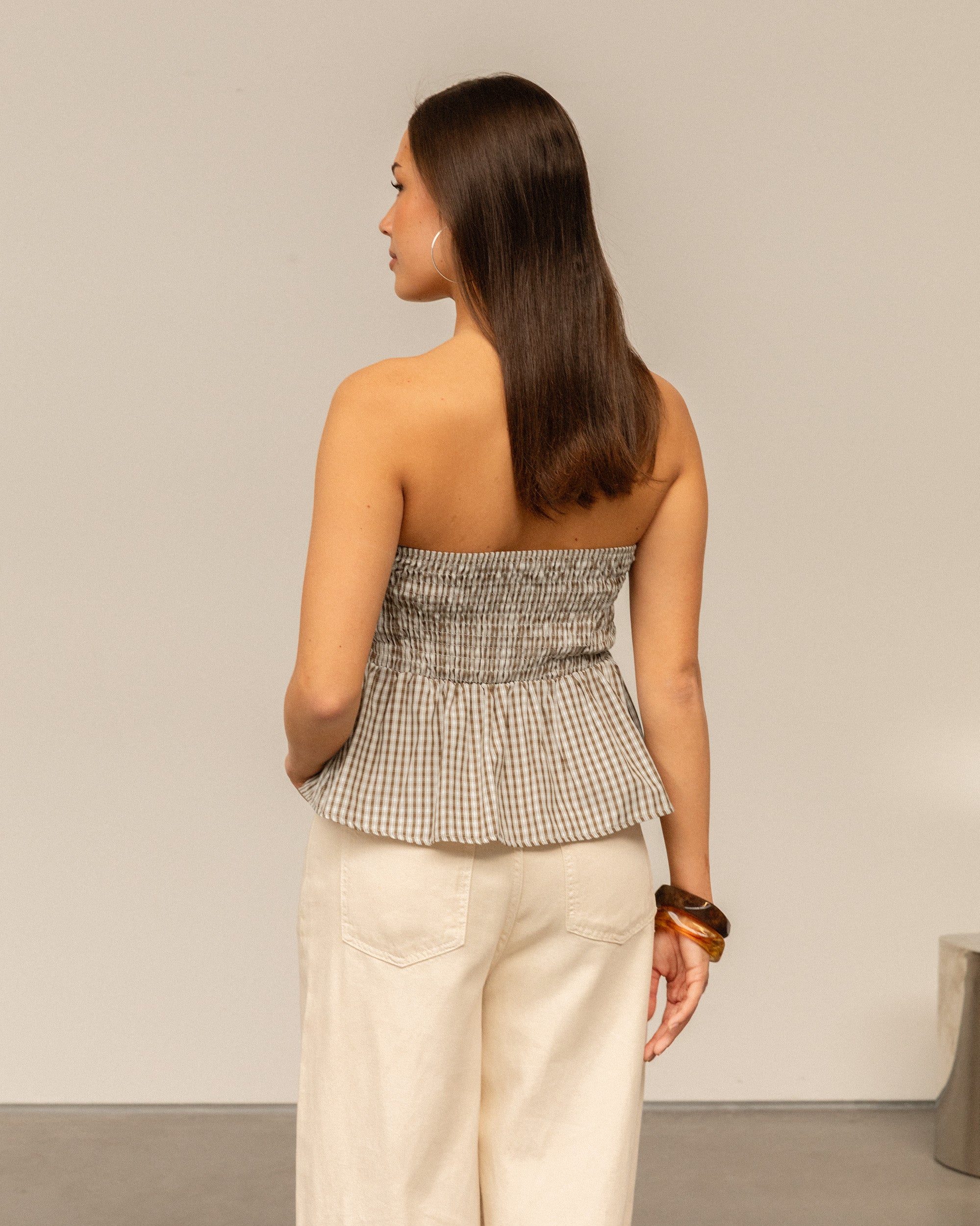LEIA CHECK PEPLUM TOP BRUIN