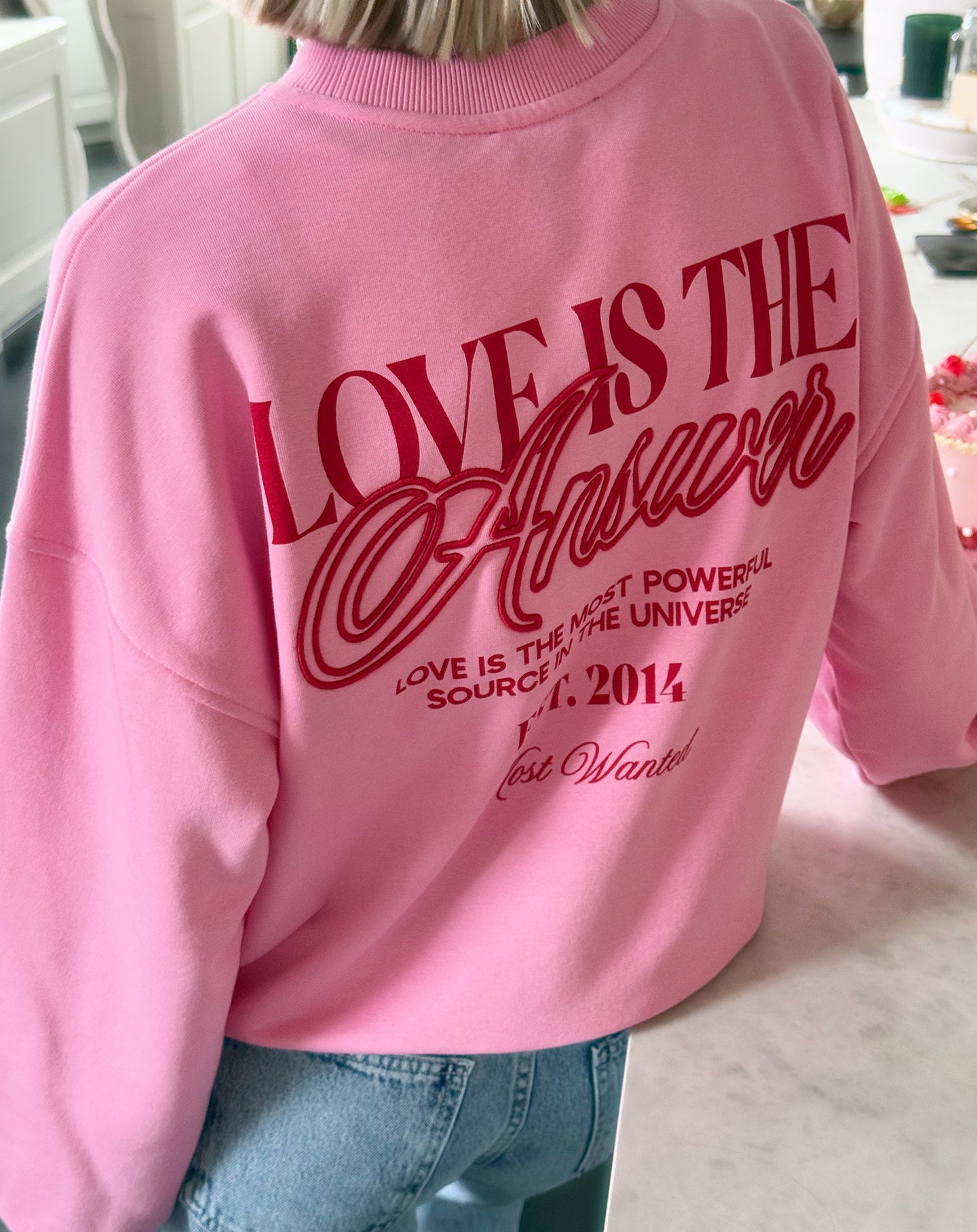 LOVE IS THE ANSWER SWEATER ROZE