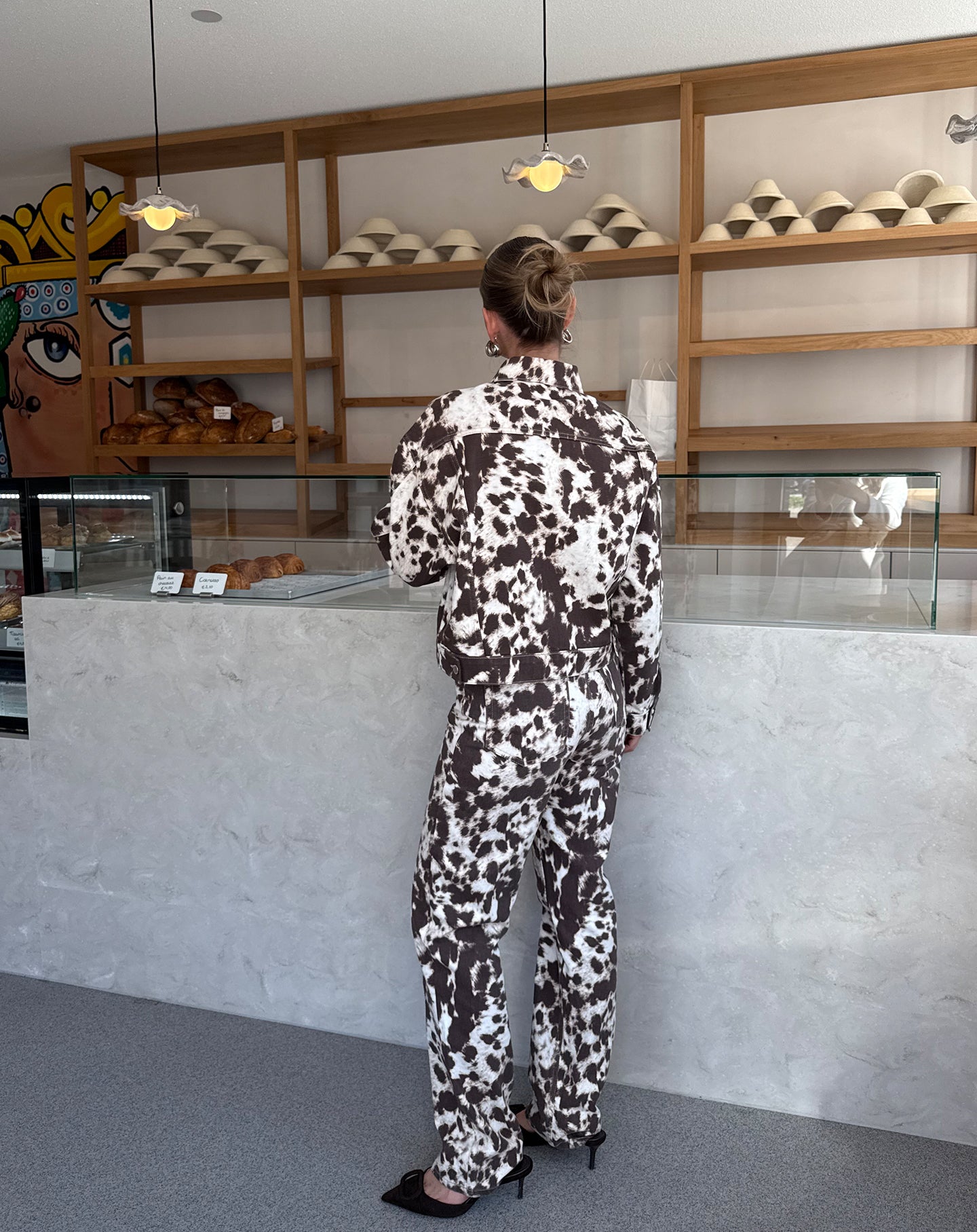 COW ALLOVER JEANS BRUIN