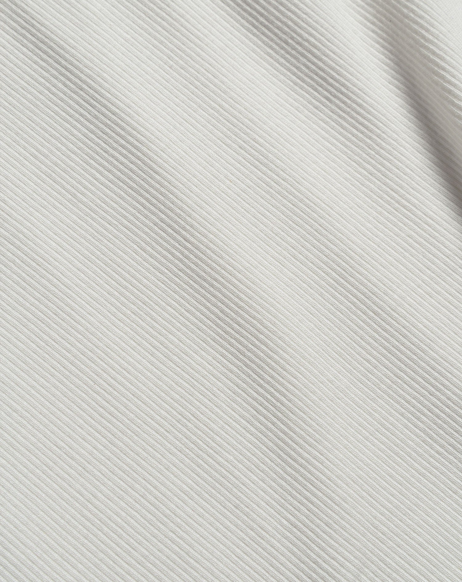 SLEEVELESS VNECK RIB TOP CRÈME