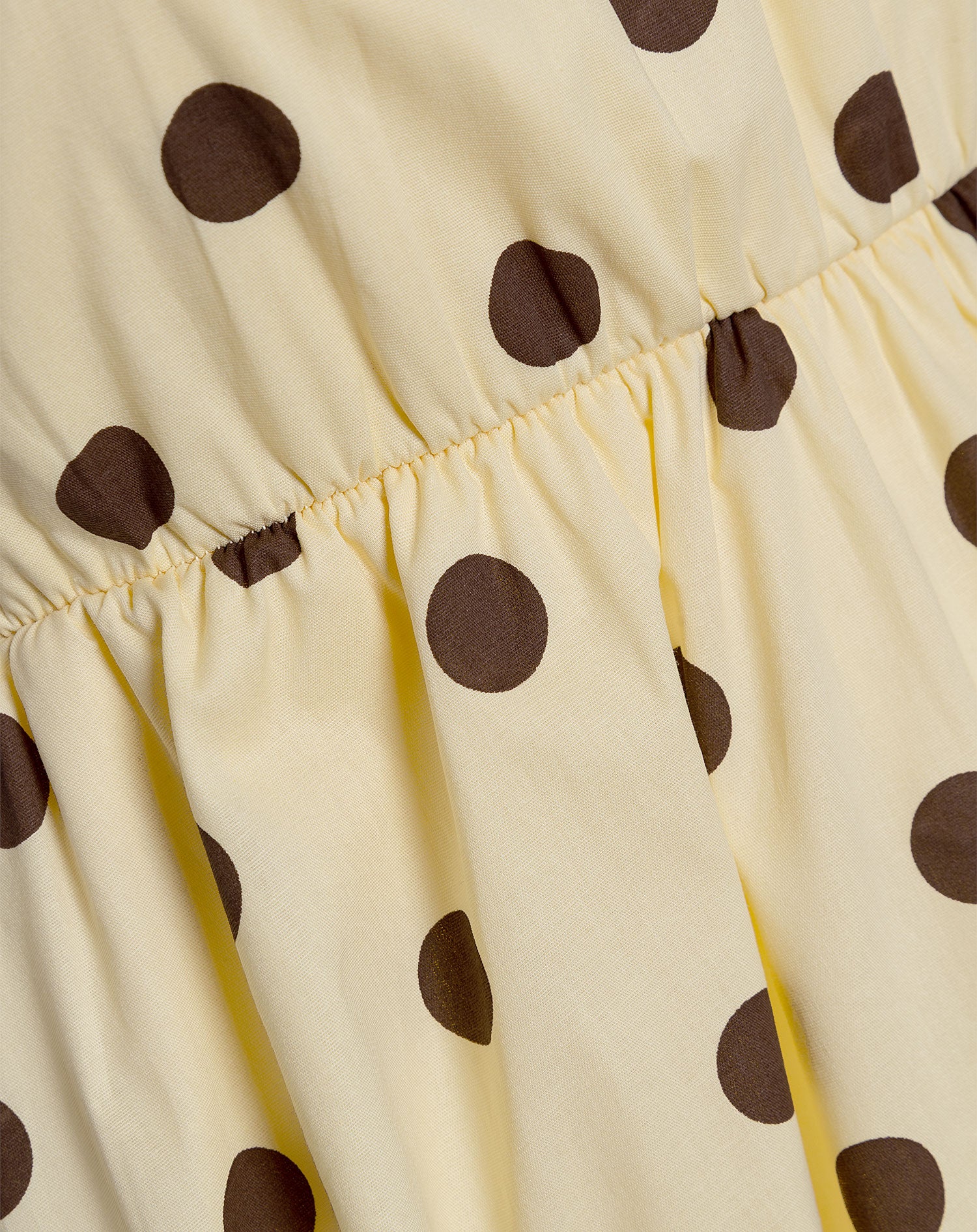 DOT PEPLUM RUFFLE TOP BOTERGEEL