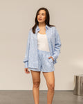 OVERSIZED FLOWER EMBELLISHED STRIPE BLOUSE  BLAUW