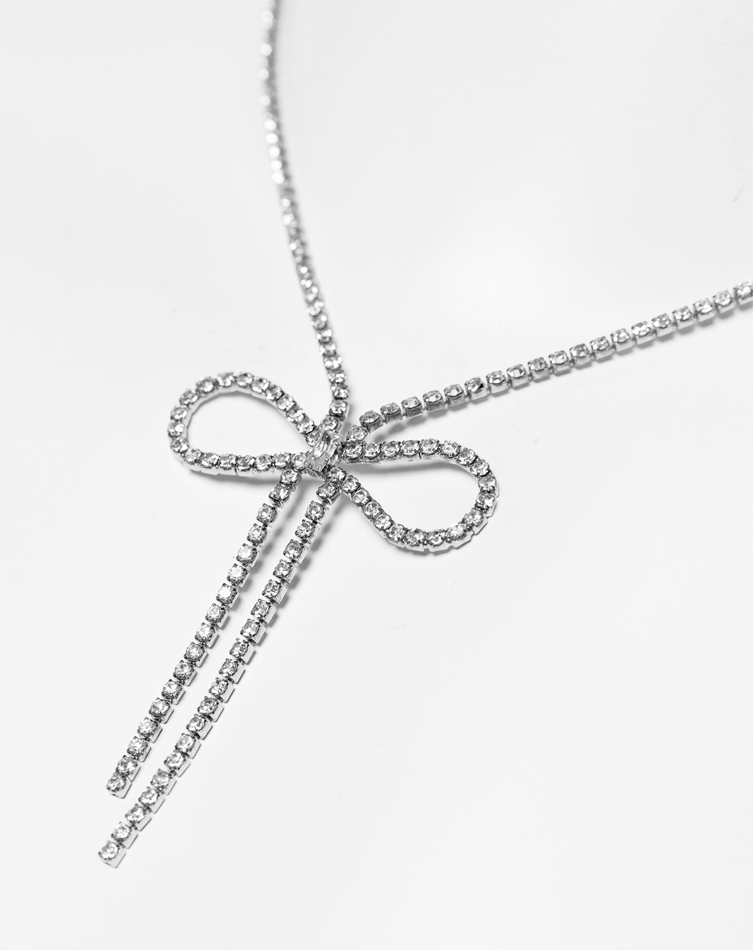 RHINESTONE BOW NECKLACE SILVER